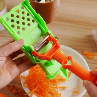 éplucheur à légumes râpe incluse