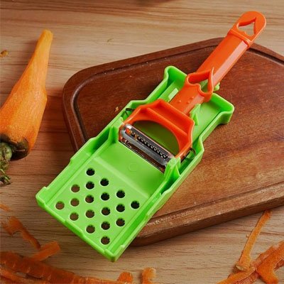 éplucheur à légumes râpe incorporée